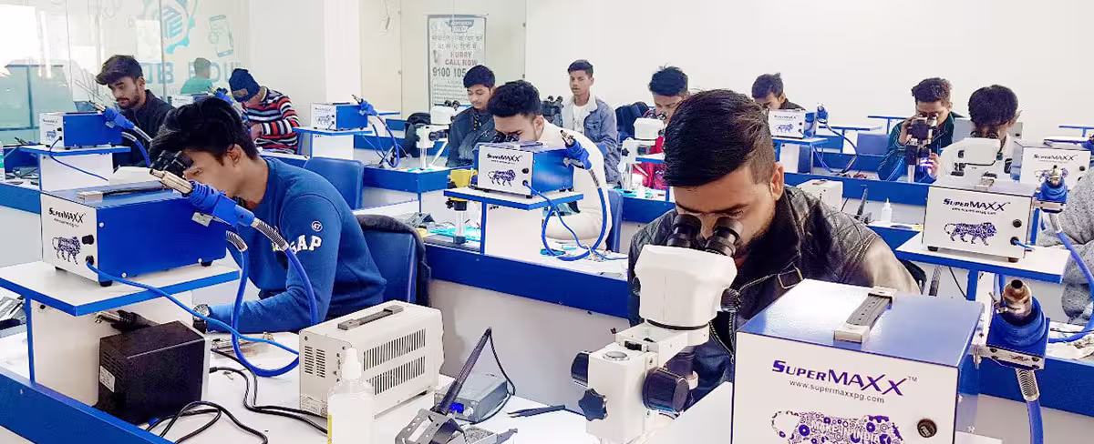 Student practicing hands-on skills in a Mobile Laptop Repair Course at Mob Edu technical training institute.