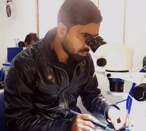 Student repairing Android smartphone during Andro Repair Master Course